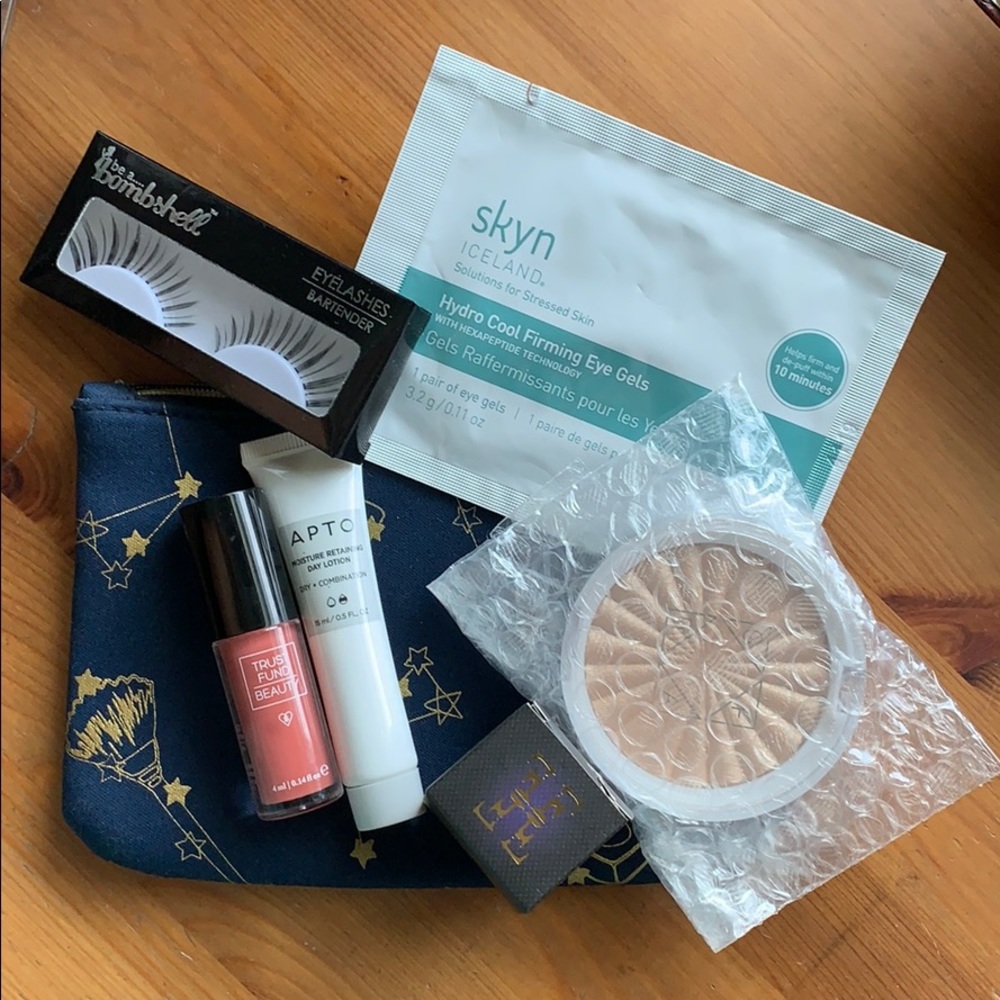 Ipsy glam bag and 6 makeup items